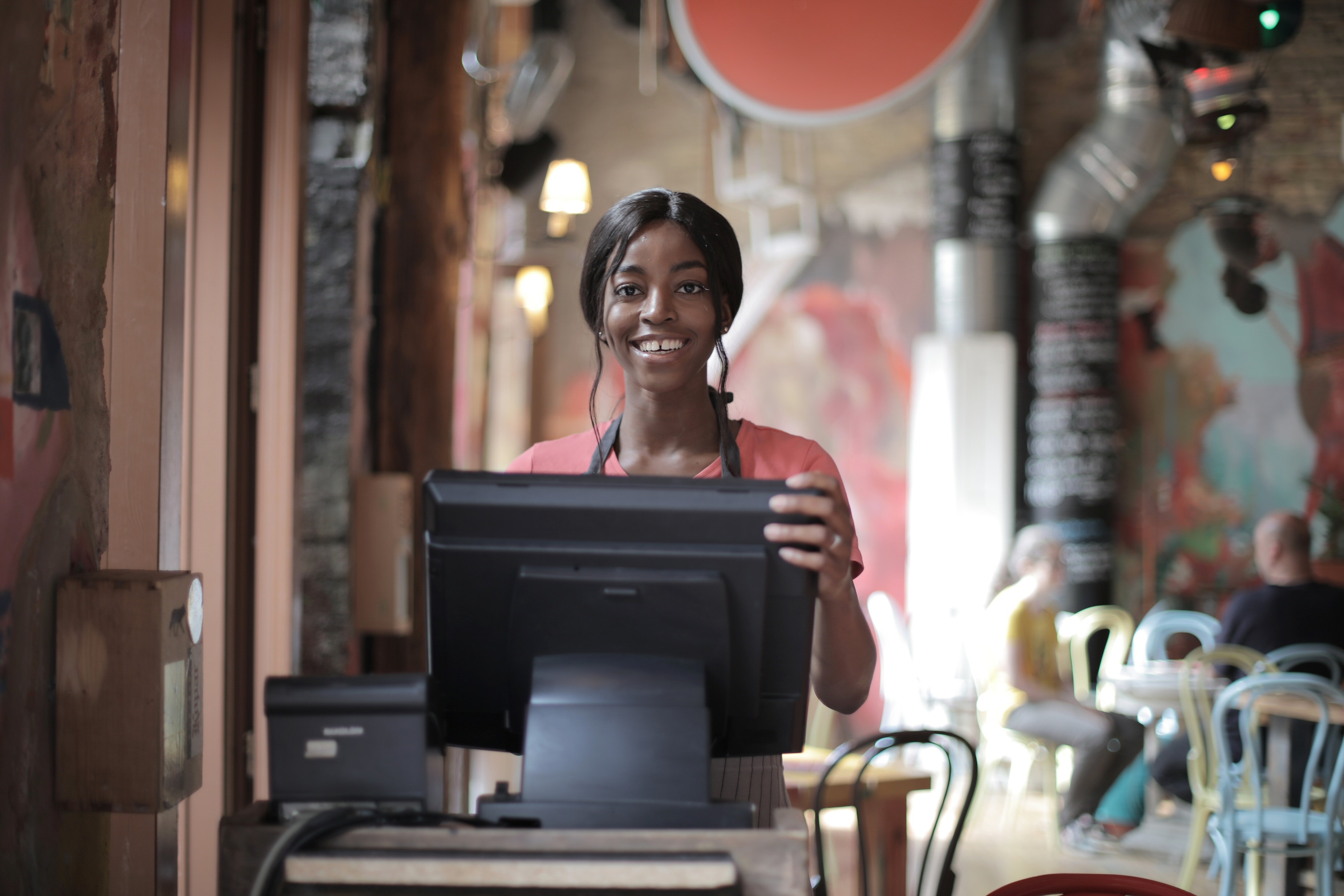 banner image, a lady standing on the counter.